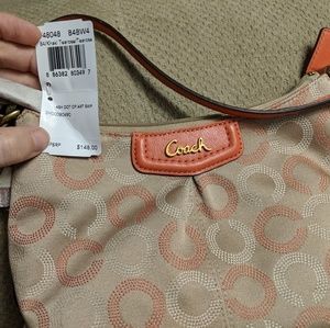 Coral and beige Coach Purse